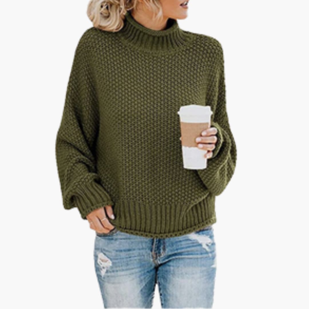 Pull femme avec col montant et surface côtelée
