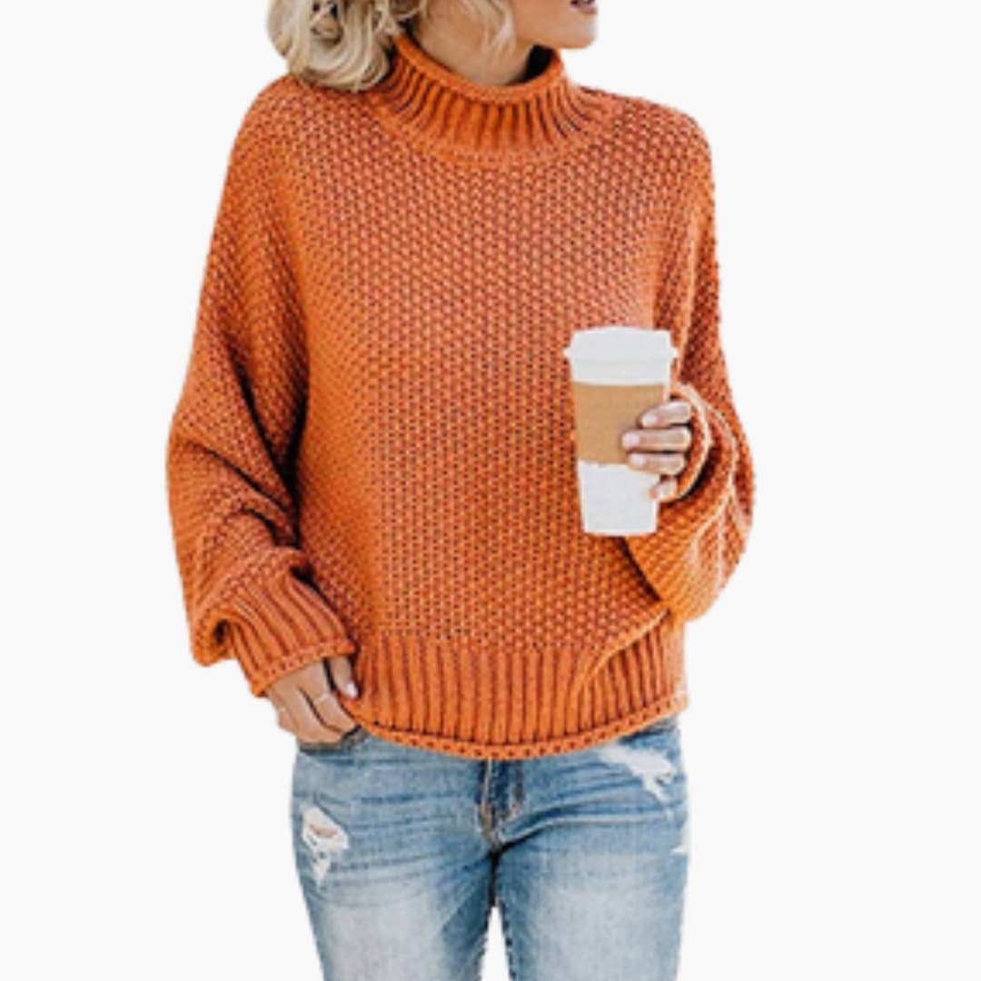 Pull femme avec col montant et surface côtelée