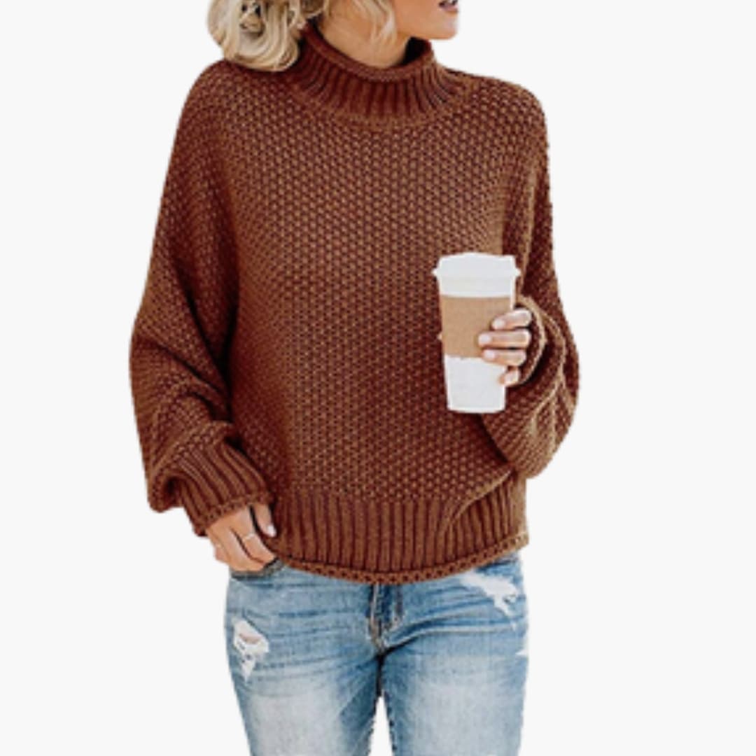 Pull femme avec col montant et surface côtelée