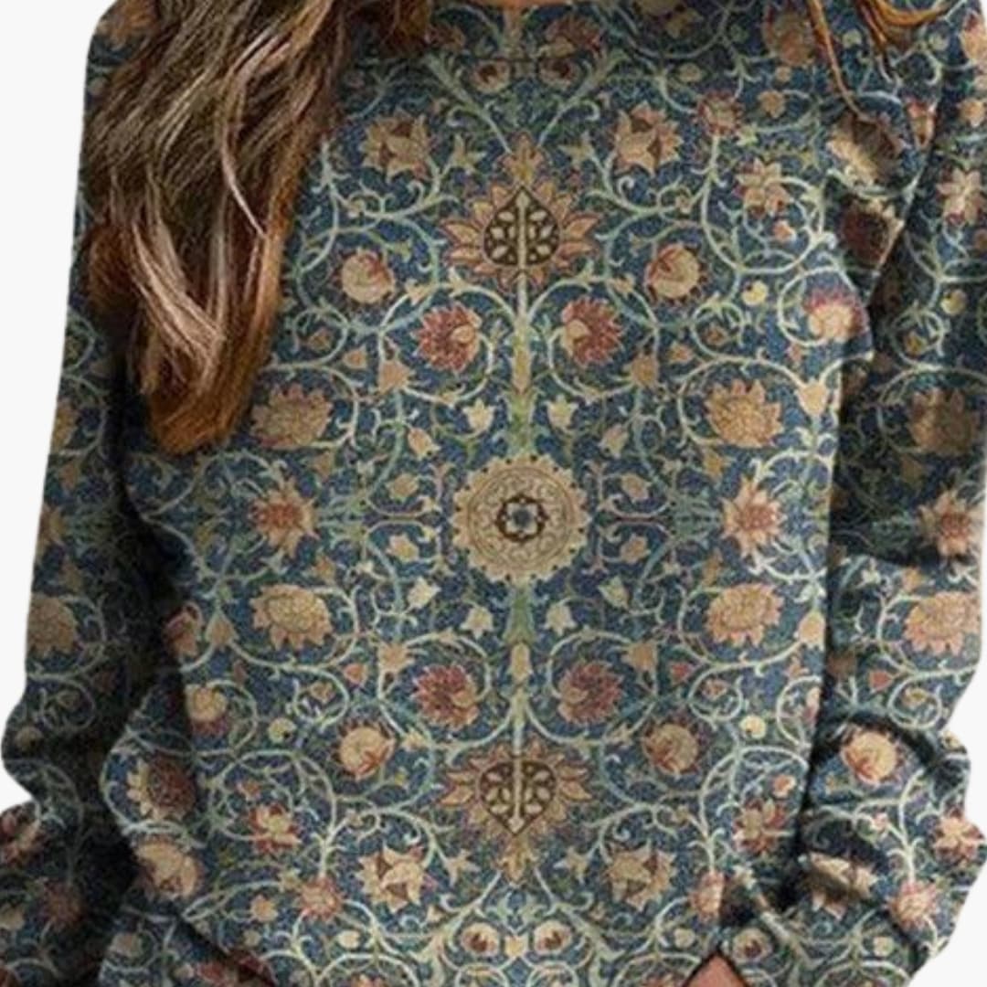 Camisola de mulher com padrão floral e superfície tricotada