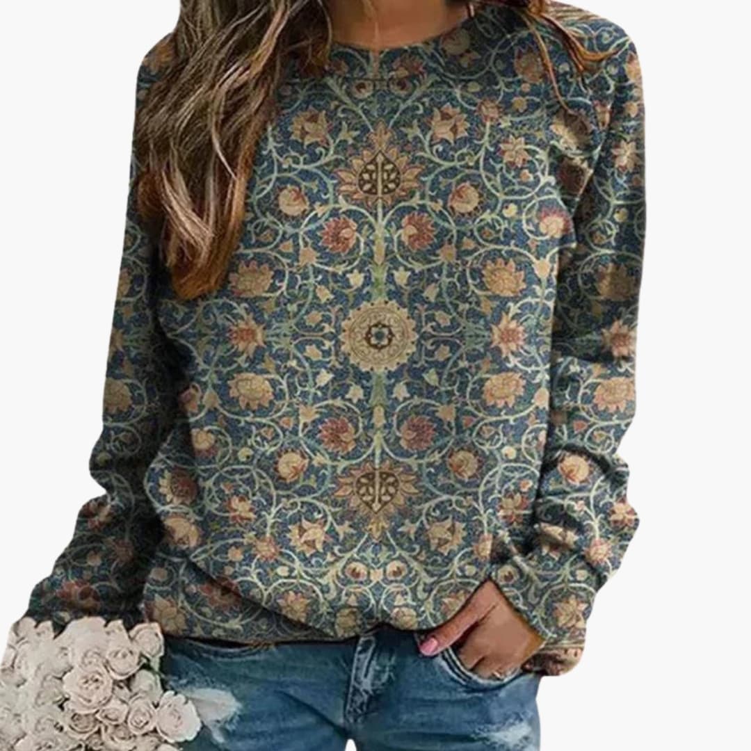 Camisola de mulher com padrão floral e superfície tricotada