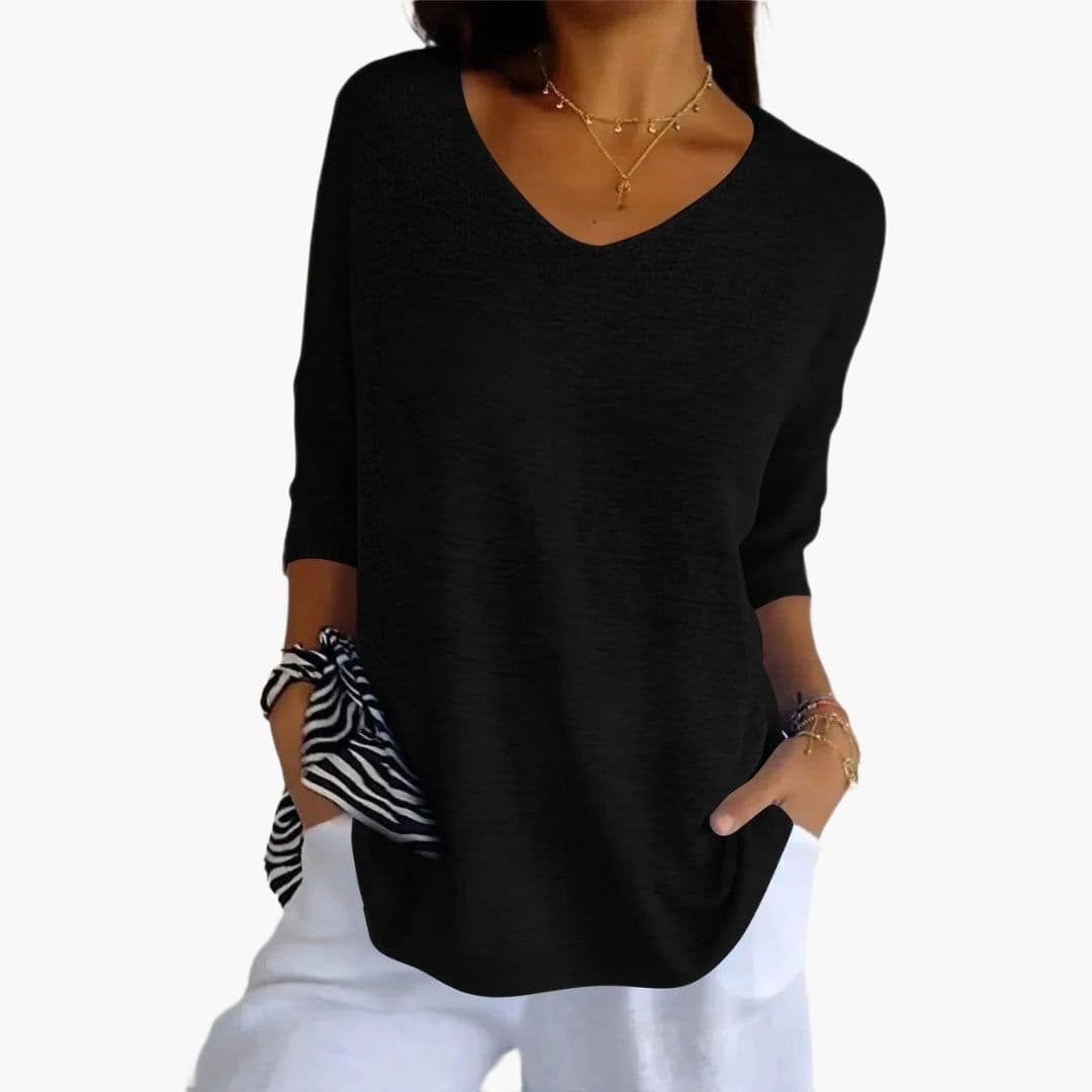Women's V-neck loose fit top with ribbed cuffs