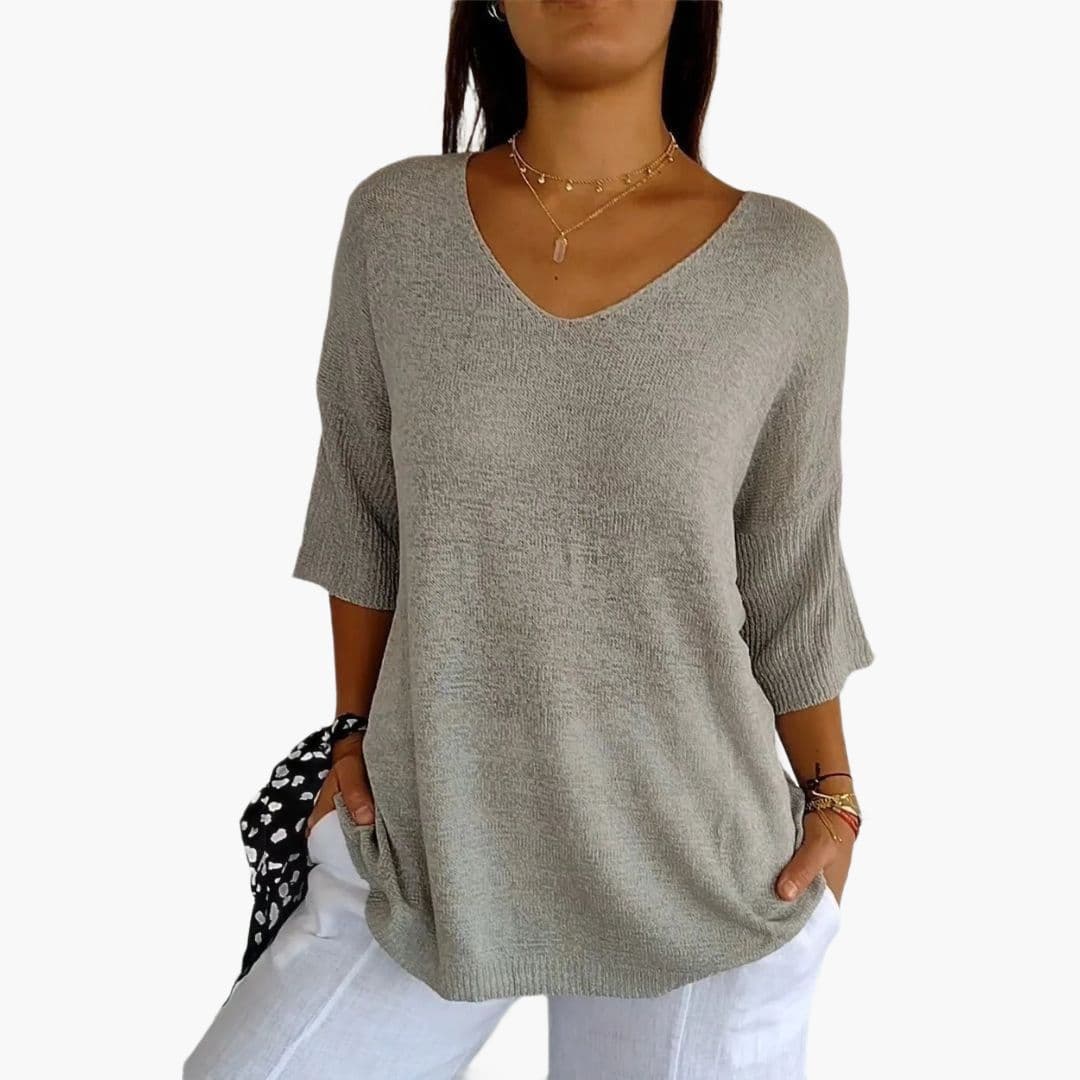 Women's V-neck loose fit top with ribbed cuffs