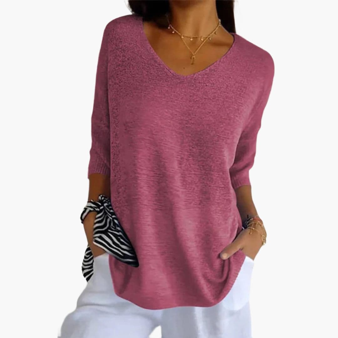 Women's V-neck loose fit top with ribbed cuffs