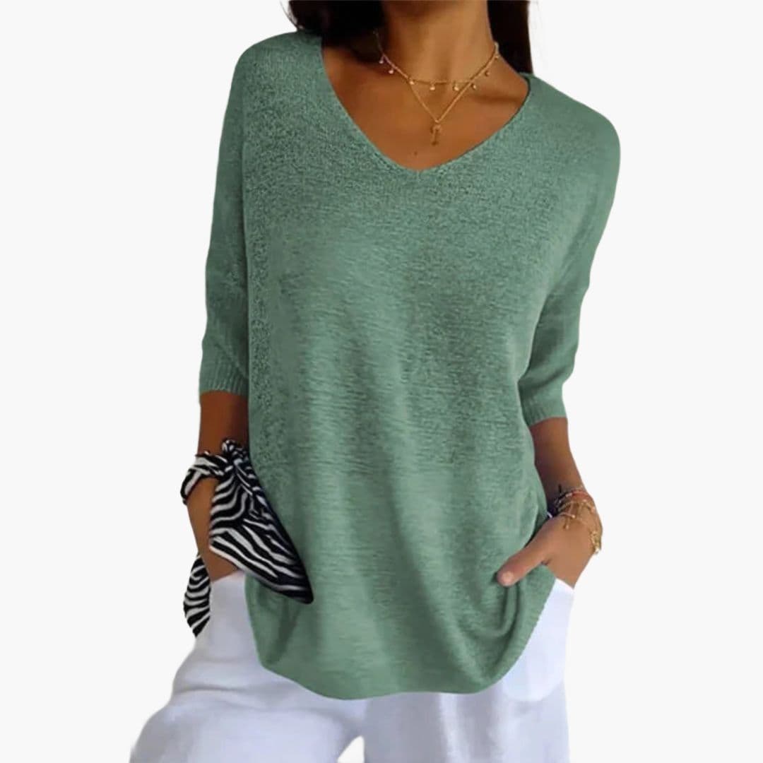 Women's V-neck loose fit top with ribbed cuffs