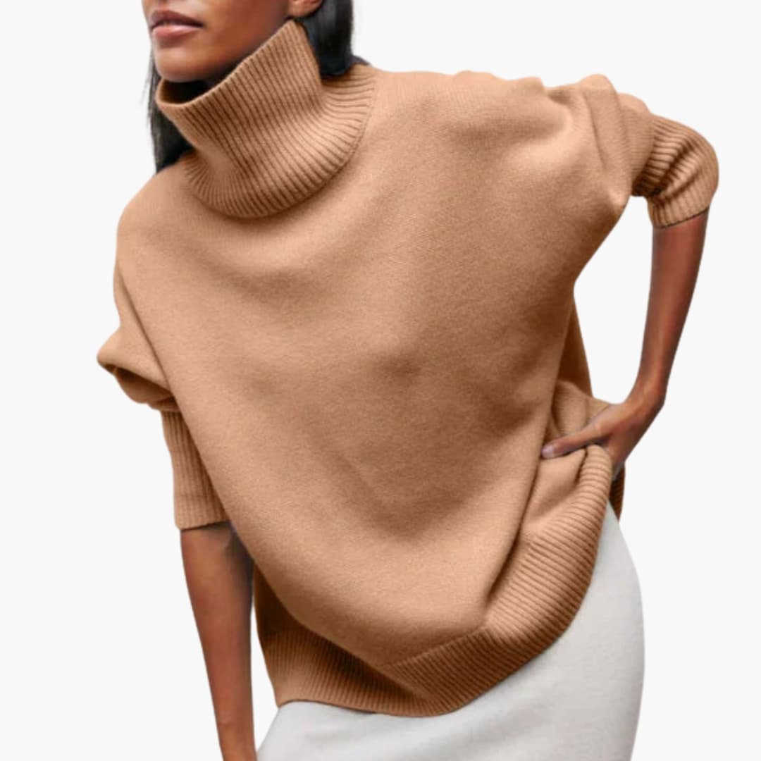 Pull femme oversize à col roulé et bords côtelés