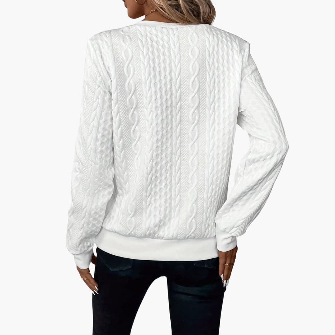 Pull femme torsadé avec col zippé et poignets côtelés