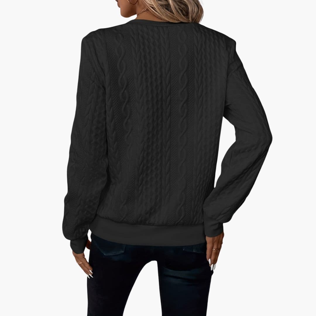 Pull femme torsadé avec col zippé et poignets côtelés