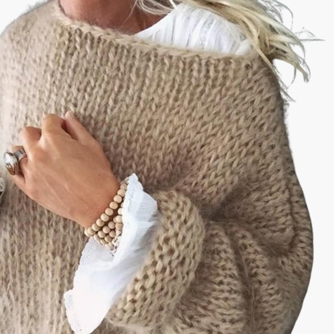 Pull femme tricoté avec motif brodé et ourlet côtelé