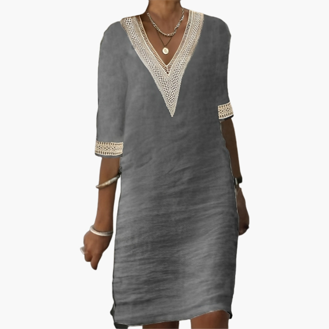 Abito donna con scollo a V e rifiniture in pizzo