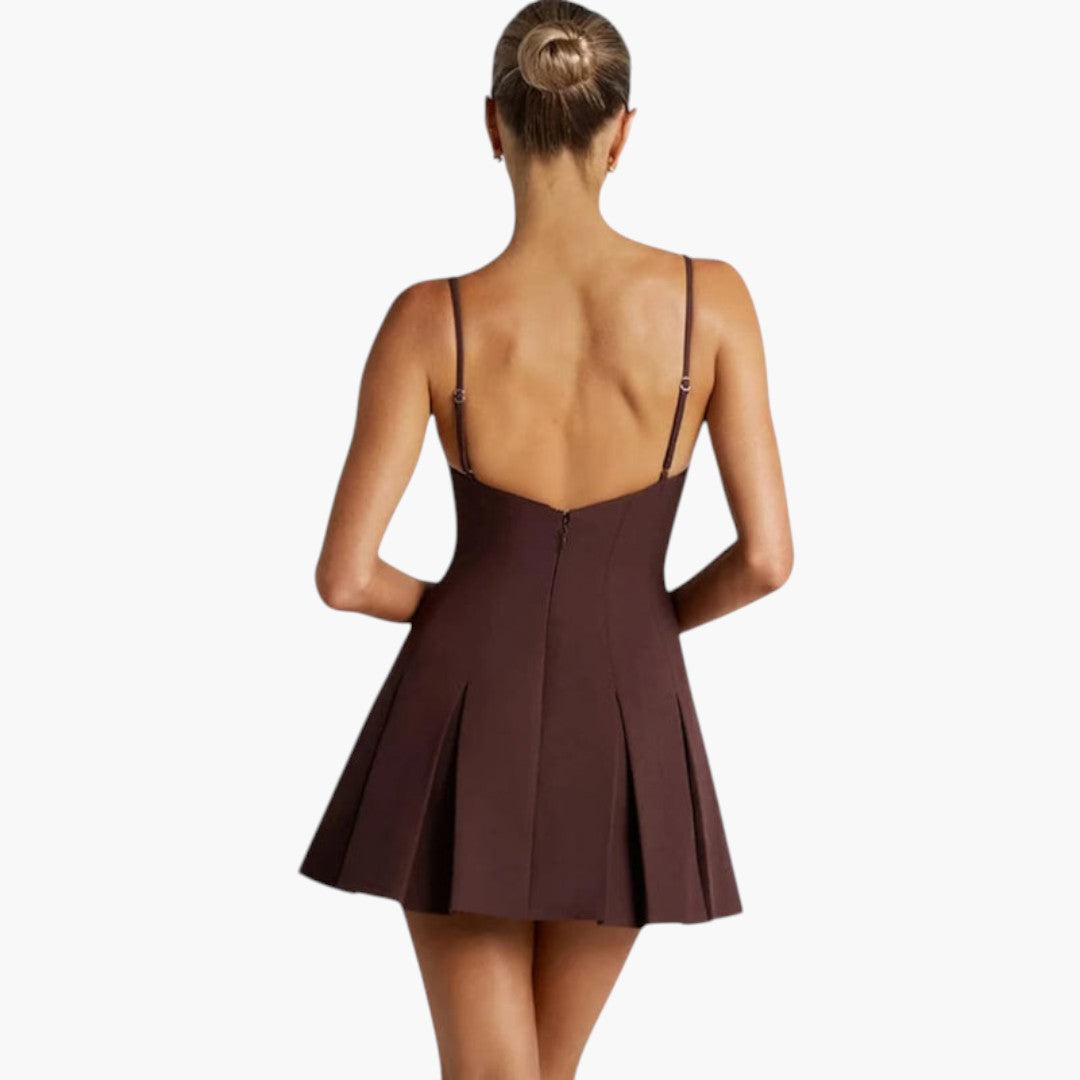 Mini-Kleid für Damen mit freiem Rücken und plissiertem Rock