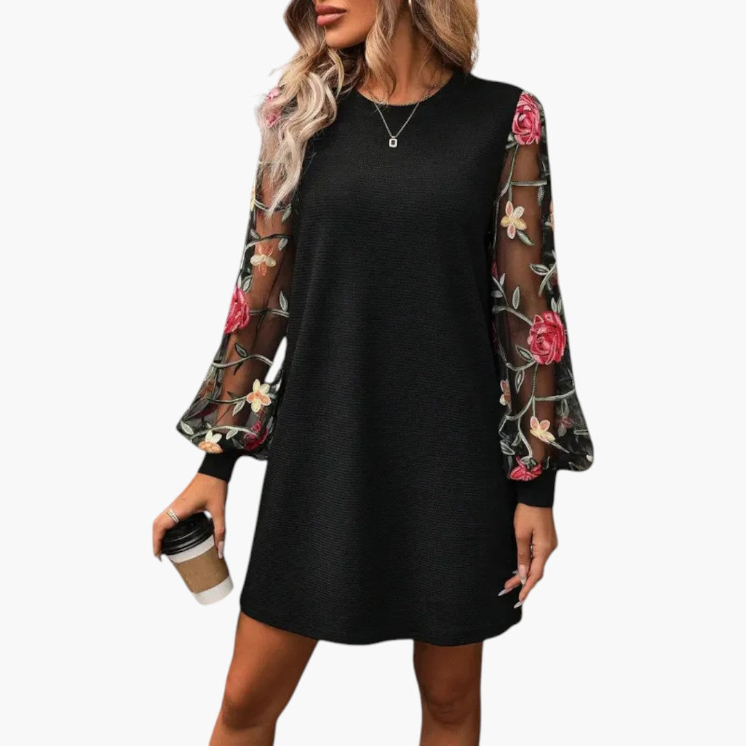 Women's mini dress with embroidered sleeves and straight cut