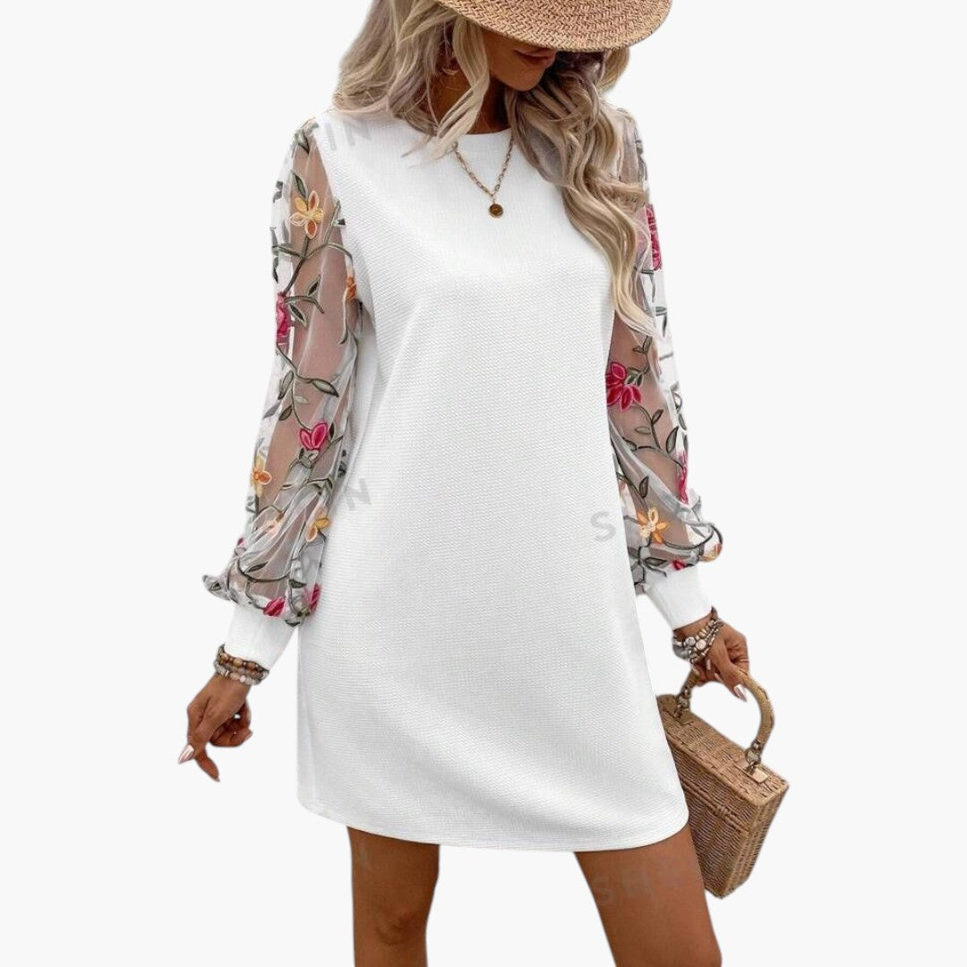 Women's mini dress with embroidered sleeves and straight cut