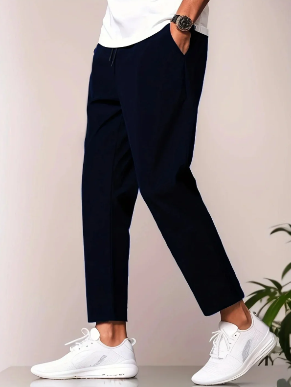 Pantalon homme coupe fuselée avec taille élastique et poches latérales