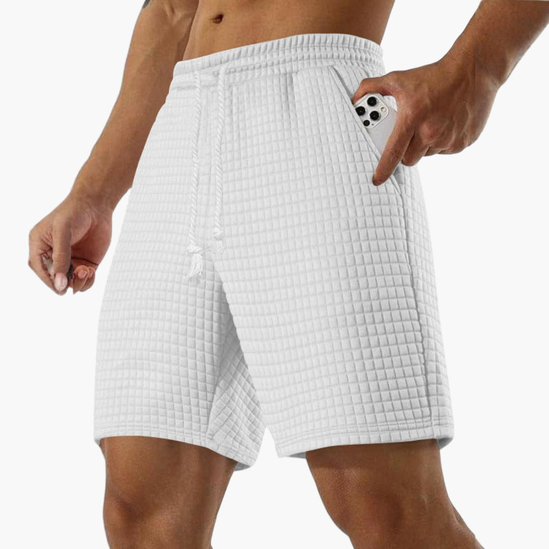 Kort sportshorts for menn med elastisk midje