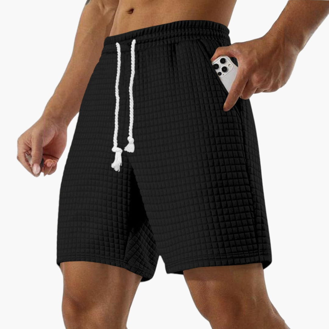 Kort sportshorts for menn med elastisk midje