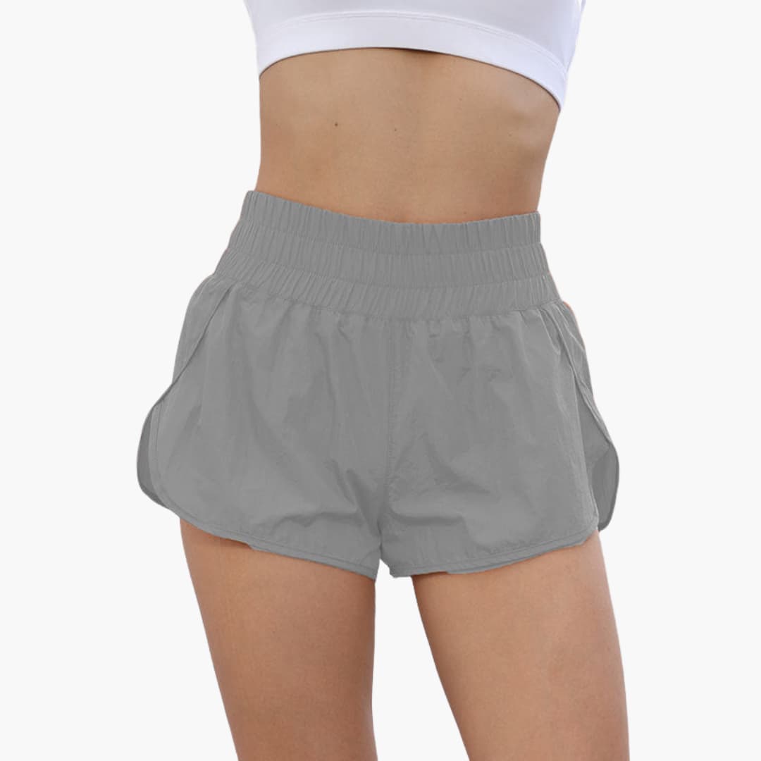 Short da corsa donna con vita elasticizzata e tasche laterali