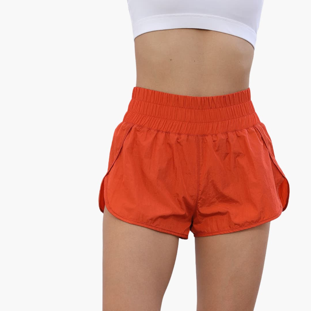 Short da corsa donna con vita elasticizzata e tasche laterali