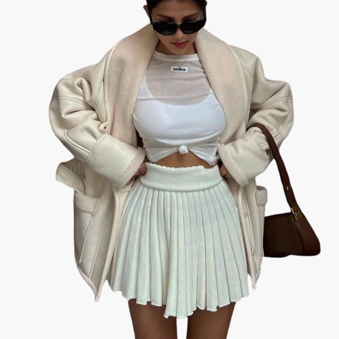 Veste femme ceinturée avec col châle et poches avant